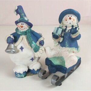 Vintage Set Of 2 Glittery Snowmen Ringing Bell & Sledding 5" Christmas Figurines